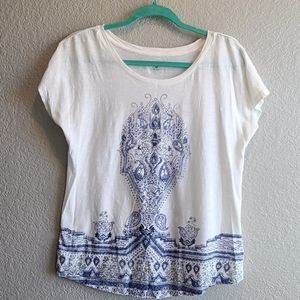 White short sleeved tee with blue motif on front, size medium